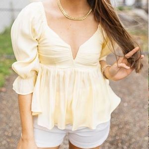 Yellow Top w/ Quarter length sleeves